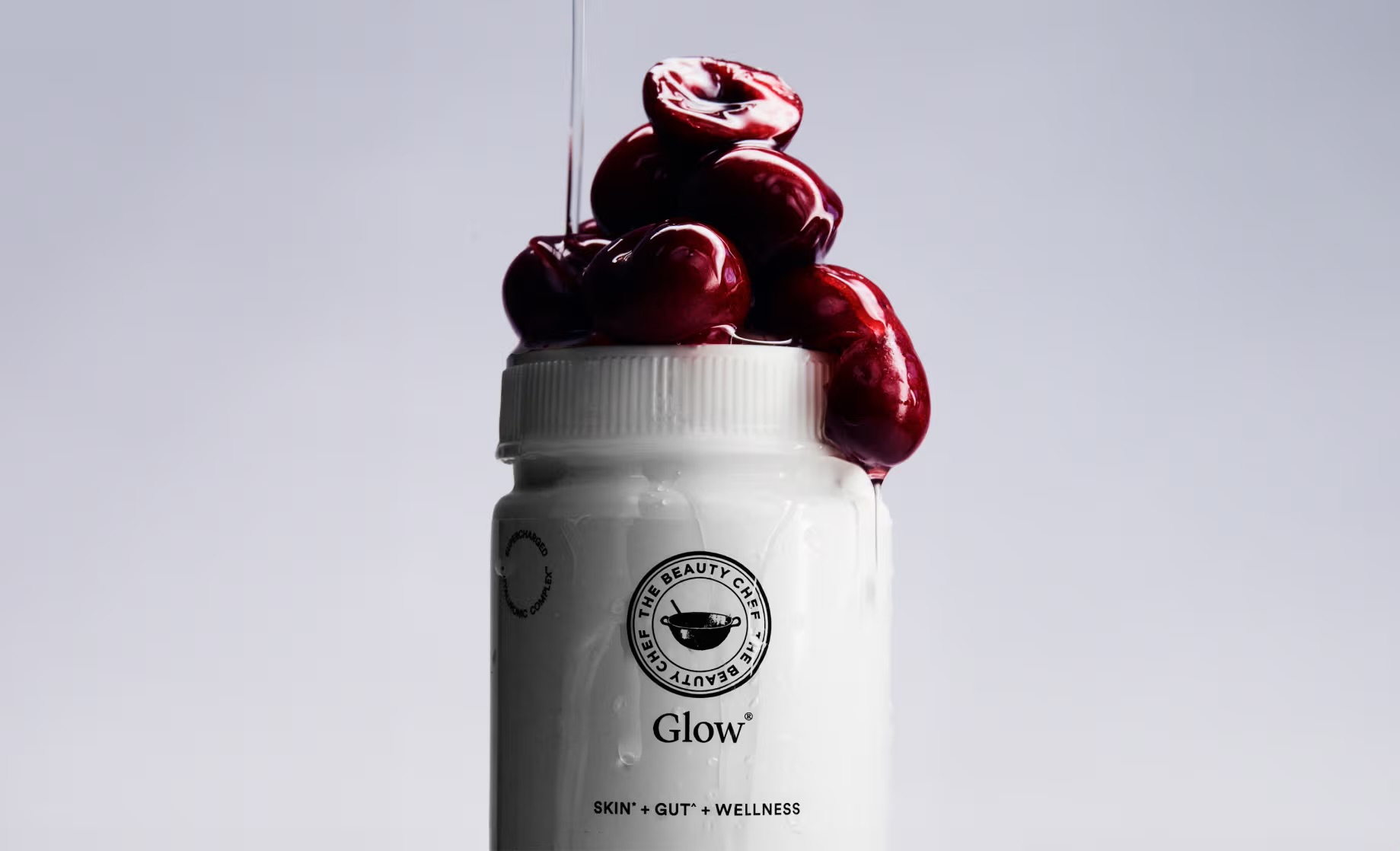The Beauty Chef Glow tub topped with cherries